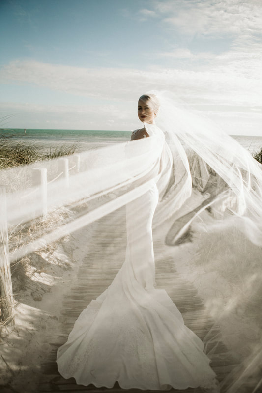 Weddings By Romi, Romi Burianova Photography, Bride in wedding dress with veil floating, artistic wedding pictures, beach wedding, bride at the beach, Key West wedding photographers, Key West wedding photography